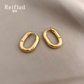 Gold-Tone Thick Polished Oval Huggie Hoop Earrings view 4