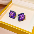 Purple Diamond Shape Crystal Stud Earrings Dark Metal Blue Rim view 4