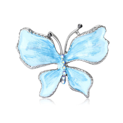 Front view of pastel butterfly with four broad wings