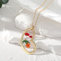 Gold Tone Pressed Flower Resin Pendant Necklaces in Eleven Shapes view 12