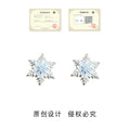 Silver Tone Pale Blue Snowflake Earrings In Stud And Clip Styles view 3