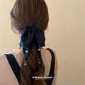 Black Glitter Crystal Edge Bow Hair Claw With Mismatched Gray Variant Image view 4