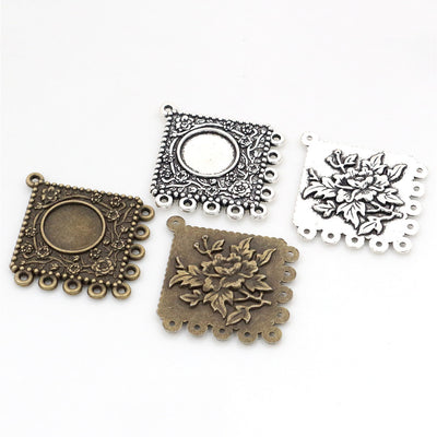 Square Floral Round Cabochon Pendant Bases in Two Finishes shown with the available finish assortment