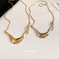 Sculptural Curved Pendant Necklace in Gold and Silver view 2