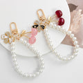 Faux Pearl Beaded Chain Bag Charm Keychain with Rhinestone Bow view 2