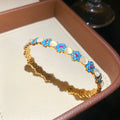 Gold Pink Halo Link Bracelet and Blue Flower Open Cuff view 7