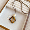 Brown Resin Geometric Pendant Cord Necklaces in Six Designs view 10