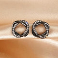 Gold Silver Black Intertwined CZ Knot Stud Earrings view 3