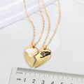 Gold Tone Broken Heart Hand Motif Pendant Necklaces in Two Designs view 2