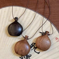 Wood Look Vessel Pendant Necklace On Brown Cord Jewelry Design view 4