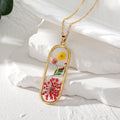 Gold Tone Pressed Flower Resin Pendant Necklaces in Eleven Shapes view 8