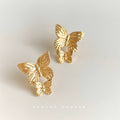 Gold Dual Butterfly Stud Earrings Textured Wing Pair view 1