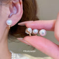 Gold Tone Spiral Clip On Earrings With White Pearls view 2