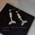 Gold Tone Pearl Drop Earrings With Whale Tail Charm Pendant view 2