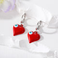 Silver Tone Puffy Heart Evil Eye Huggie Earrings in Five Colors view 6