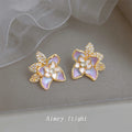 Gold Iridescent Purple Enamel Flower Crystal Leaf Studs view 1