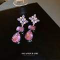 Purple Crystal Floral Teardrop Earrings With Polished Metal Tone Details view 6