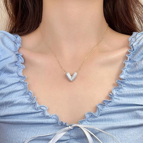 displayed product view of pastel heart pendant necklaces