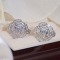 Sculpted Rose Clear Stone Stud Earrings In Gold And Silver Tones view 1