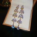 Crystal Leaf Cascade Drop Earrings In Gold And Silver Tones view 6