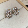 Crinkled Geometric Stud Earrings in Gold and Silver view 6