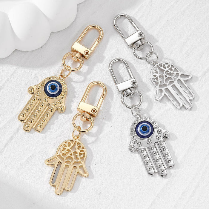 Gold and Silver Tone Openwork Hamsa Evil Eye Clip Keychains