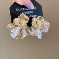 White Openwork Flower and Crystal Cluster Stud Earrings view 6