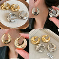 Sculptural Folded Metal Huggie Earrings in Silver and Gold Tone view 1