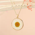 Gold Tone Round Pressed Daisy Resin Pendant Necklaces in Two Colors view 5