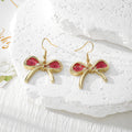 Gold Bow Dried Flower Resin Earrings Ten Color Styles view 8