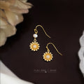 Asymmetric Gold Daisy Drop Earrings One Side Freshwater Pearl view 1