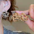 Woven Knot Metal Stud Earrings in Silver and Gold Tones view 1