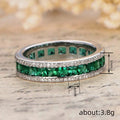 Green Square Stone Channel Eternity Band In Silver Tone view 4