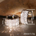Silver-Tone Triple-Row Baguette Huggie Earrings with Clear Stone Details view 4
