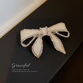 Three Hair Clip Styles With Pink Cat Silver Bow Or Purple Flowers view 3