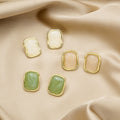 White and Pink Rounded Rectangle Gold Rim Stud Earrings view 1