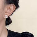 Gold White Three Petal Flower Stud Earrings With Pearl Centers view 2