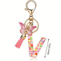Glitter Resin Letter Keychain with Butterfly Charm and Tassel view 5