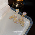 Gold-Tone Faux Pearl and Cubic Zirconia Mermaid Tail Earrings view 2
