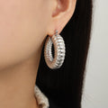 Gold Ribbed Twisted Hoop Earrings Gold And Steel Finishes view 8