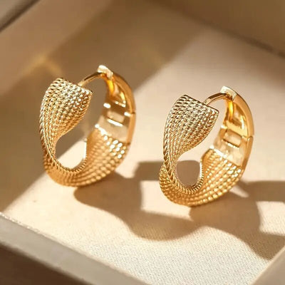 Gold Tone Textured Twist Hoop Earrings Polished Metal Jewelry alternate close-up view