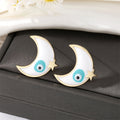 Gold Tone Enamel Crescent Moon Evil Eye Stud Earrings in Five Colors view 6