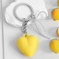 Puffy Heart Charm Keychain With Bow Detail And Colored Chain Strap view 6