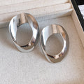 Sculptural Open Oval Earrings in Gold and Silver Tones view 9