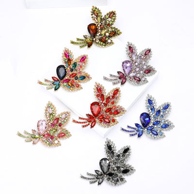 Front view of the large faceted glass leaf cluster brooch in seven colors brooch and its color options