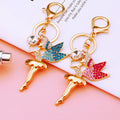 Jeweled Gem Holding Angel Keychains in Pink Blue and Assorted Colors view 2