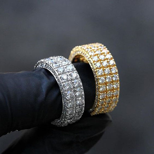 Product view showing round clear-stone eternity band rings