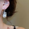 Silver Crystal and Pearl Huggie Earrings with Floral Accents view 3