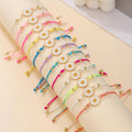 Twelve Daisy Cord Bracelets Adjustable Multicolor Set view 3
