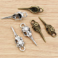 Bird Skull and Scissor-Shaped Charms in Bronze and Silver view 4